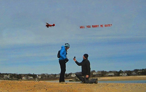 will you marry me banner over Cape Cod